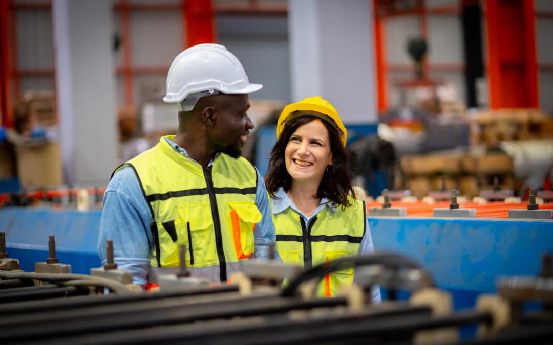 two workers in an industrial setting