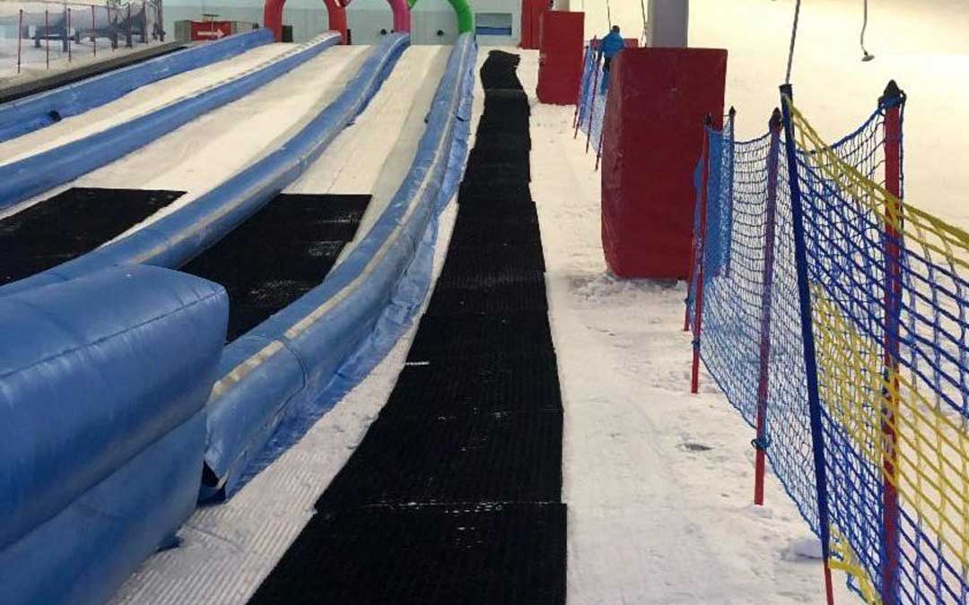 a pathway of Grassmats used to improve traction and safety on icy walkways